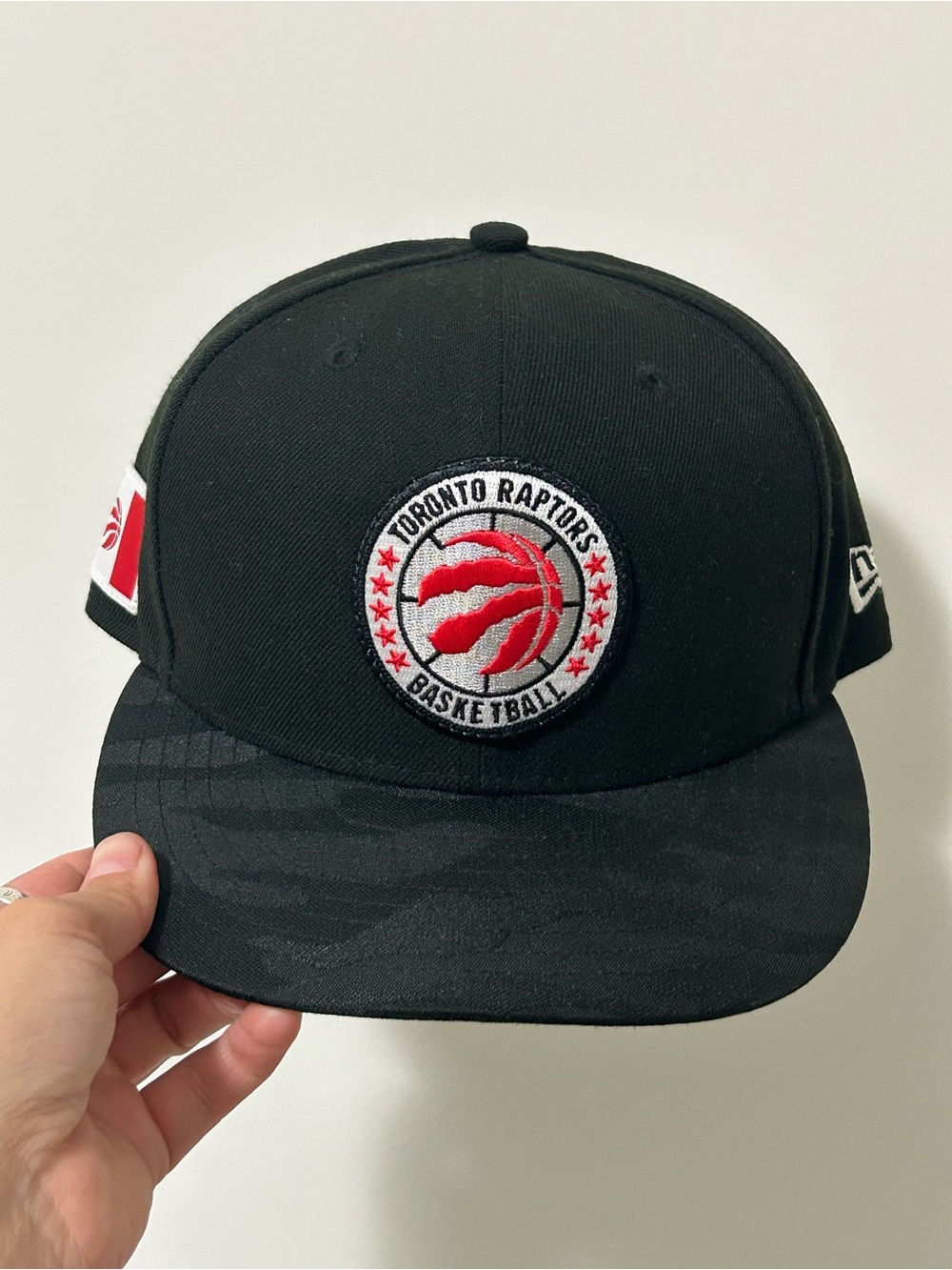 New Era Toronto Raptors Black Snapback with Red Logo Adjustable Cap